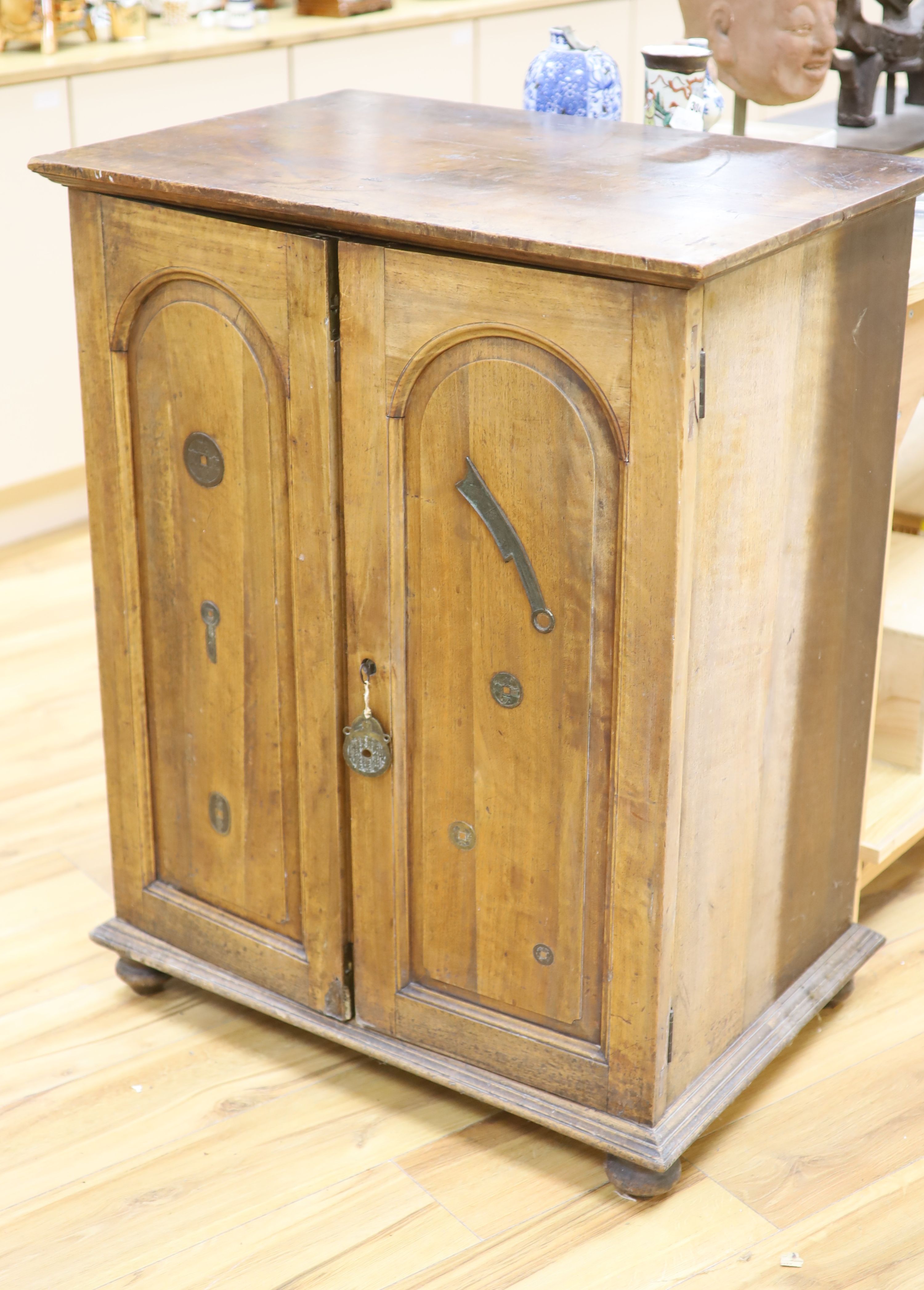 A walnut collectors cabinet for Chinese and Asian amulets and coins, early 20th century,